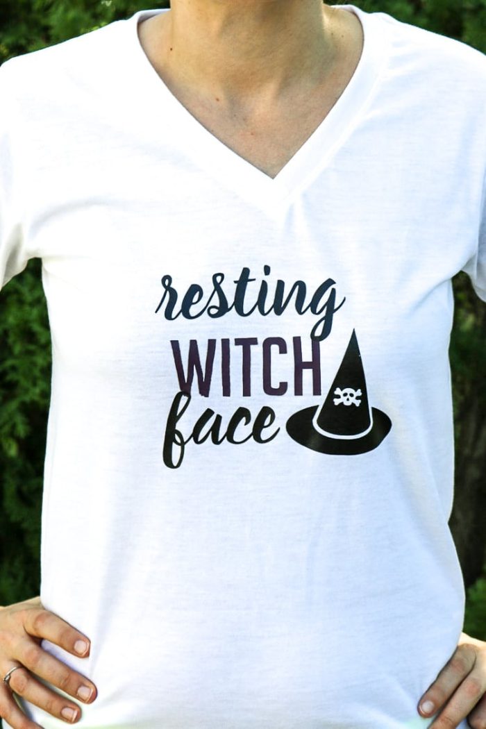 Girl wearing Shirt with Vinyl Resting Witch Face design